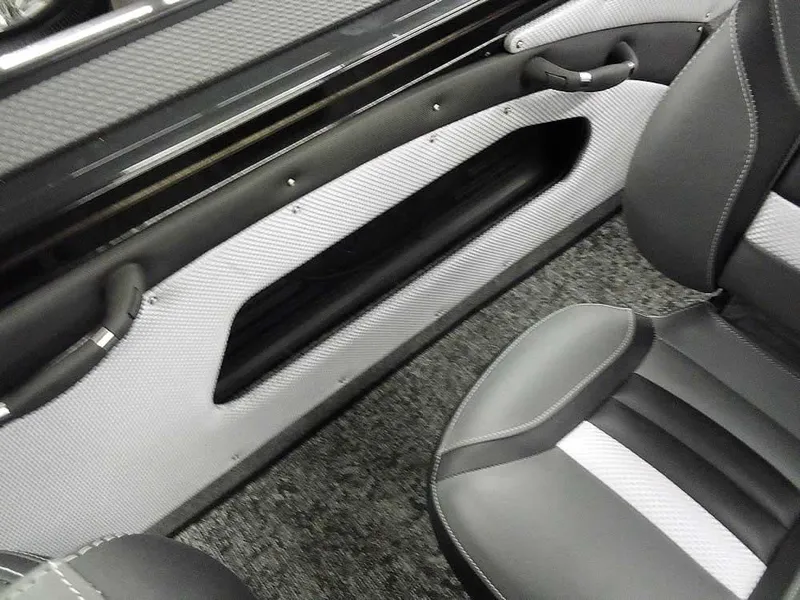 Slide: The Image of 2025 Ranger VX1888 WT interior with sleek black and gray seating design. - 30