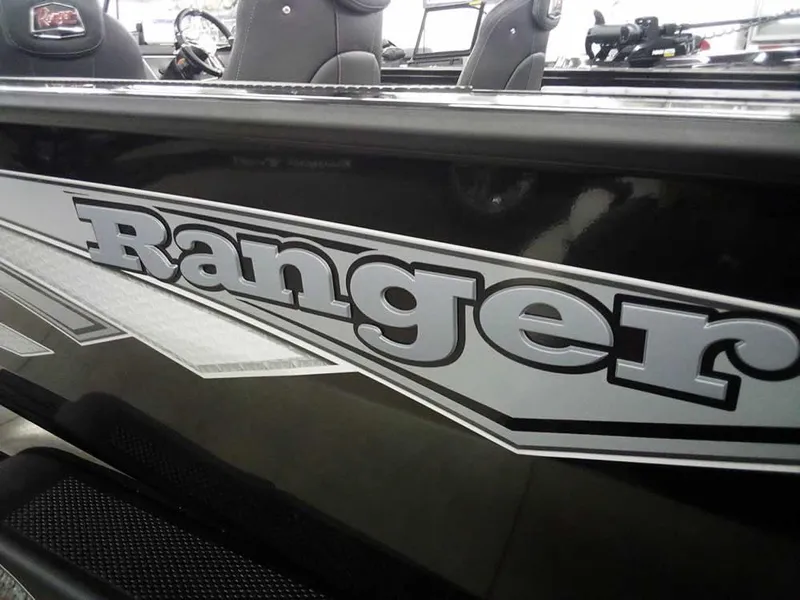 Slide: The Image of 2025 Ranger VX1888 WT boat with bold logo on sleek black exterior. - 9