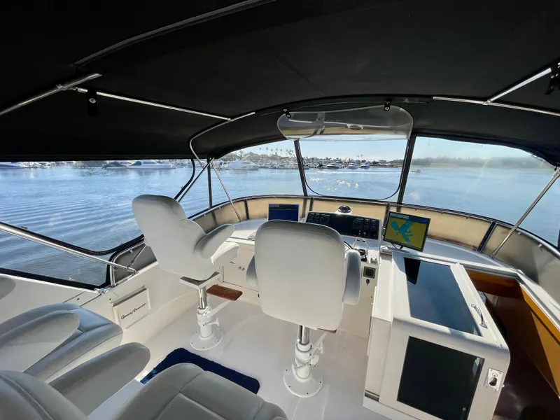 Slide: The Image of Interior view of 2003 Ocean Alexander 510 Classico yacht helm with panoramic windows. - 17