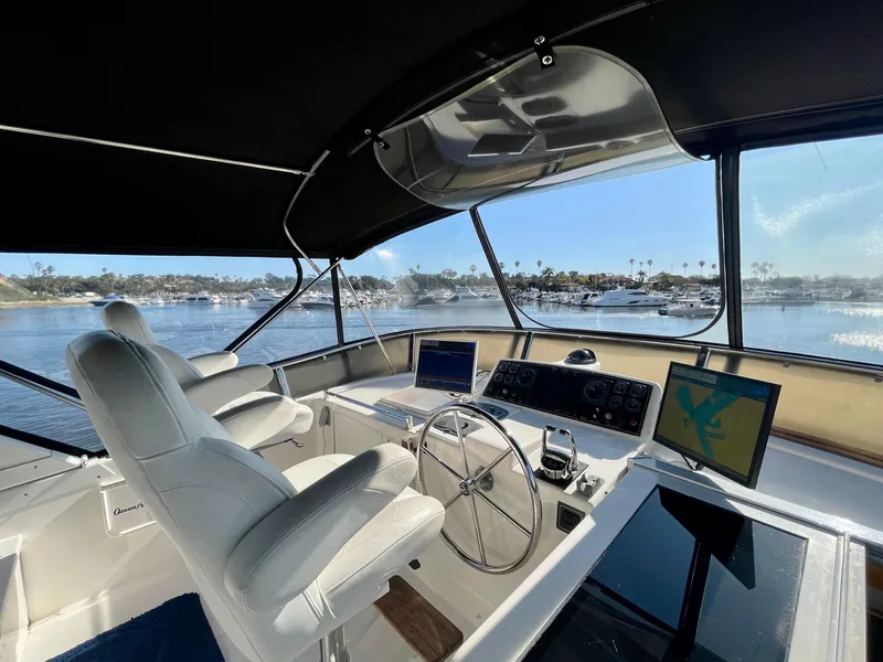 Slide: The Image of Interior view of 2003 Ocean Alexander 510 Classico yacht cockpit with navigation equipment. - 18
