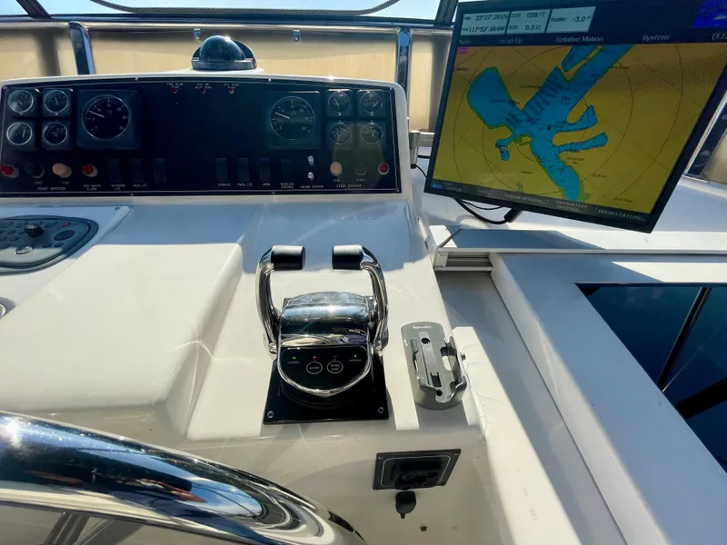 Slide: The Image of Control panel of 2003 Ocean Alexander 510 Classico yacht with navigation screen. - 25