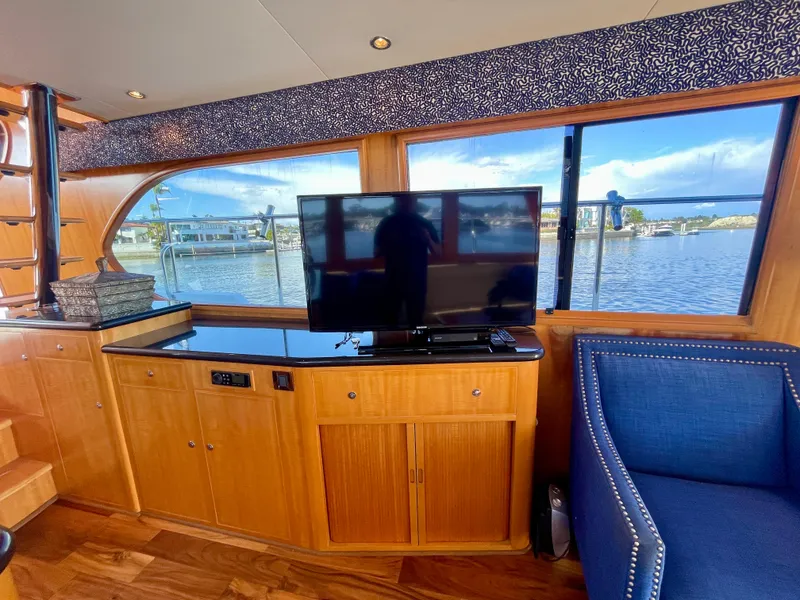 Slide: The Image of Luxurious interior of 2003 Ocean Alexander 510 Classico yacht with TV and scenic window view. - 35