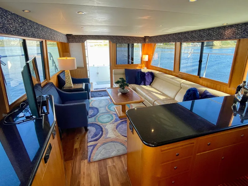 Slide: The Image of Luxurious interior of 2003 Ocean Alexander 510 Classico yacht with elegant seating and panoramic windows. - 43