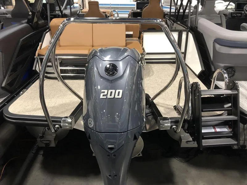 Slide: The Image of 2025 Bennington M Swingback 22 MSB with powerful 200 HP outboard motor. - 13