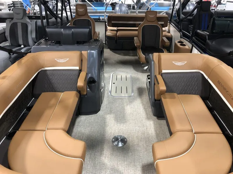 Slide: The Image of 2025 Bennington M Swingback 22 MSB interior with tan seating and modern design. - 3