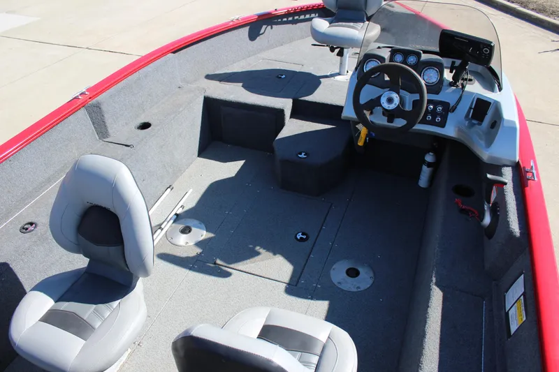 Slide: The Image of 2018 Tracker Pro Guide V-175 SC boat interior with seating and steering console. - 13