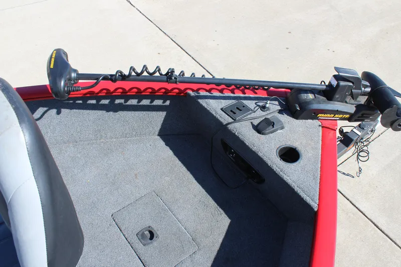 Slide: The Image of 2018 Tracker Pro Guide V-175 SC boat deck with trolling motor and carpeted surface. - 21