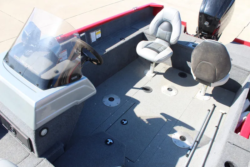 Slide: The Image of 2018 Tracker Pro Guide V-175 SC boat interior with seating and steering console. - 24