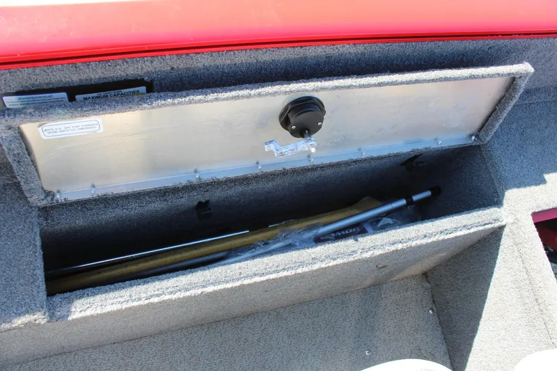 Slide: The Image of 2018 Tracker Pro Guide V-175 SC boat storage compartment with fishing rod. - 26