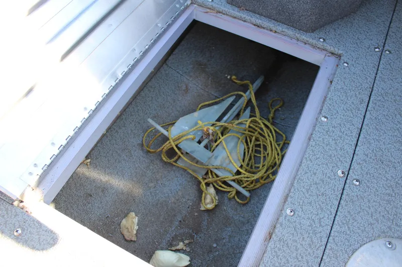 Slide: The Image of Storage compartment with anchor and rope in 2018 Tracker Pro Guide V-175 SC boat. - 34