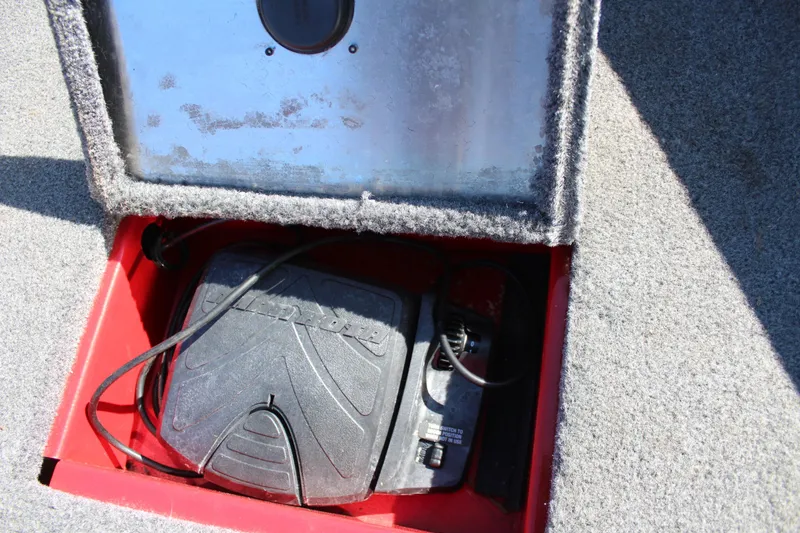 Slide: The Image of 2018 Tracker Pro Guide V-175 SC battery compartment with wiring and cover. - 36