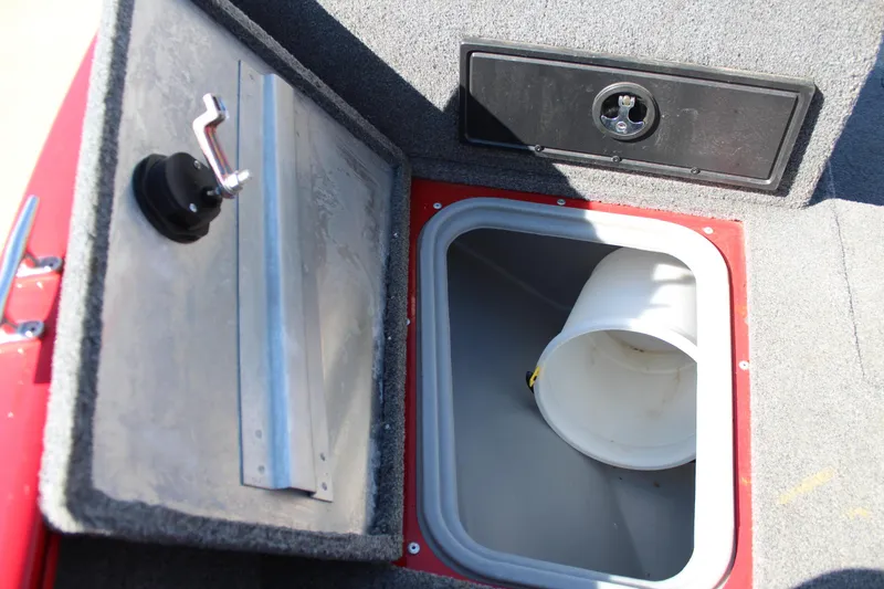 Slide: The Image of Open storage compartment in 2018 Tracker Pro Guide V-175 SC boat. - 39