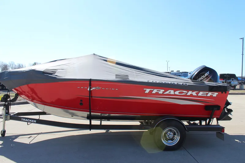 Slide: The Image of 2018 Tracker Pro Guide V-175 SC boat with cover on trailer. - 44