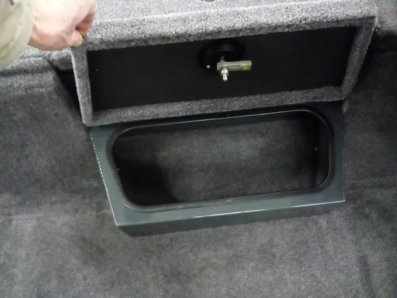 Slide: The Image of Storage compartment in 2025 Ranger RT188P boat, featuring a secure latch mechanism. - 11