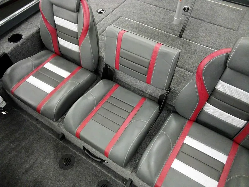 Slide: The Image of 2025 Ranger RT188P boat seats with gray, red, and white upholstery. - 20