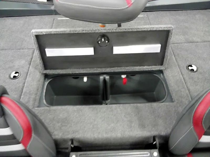 Slide: The Image of 2025 Ranger RT188P boat storage compartment with open lid, showcasing interior space and seating. - 25