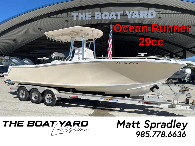 Slide: The Image of 2009 Ocean Runner 29 cc boat on trailer at The Boat Yard, Louisiana. - 1