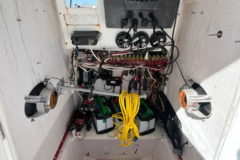 Slide: The Image of 2009 Ocean Runner 29 cc boat electrical system with wiring and batteries. - 20