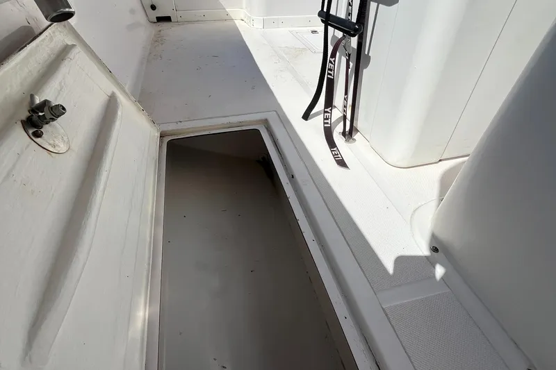 Slide: The Image of 2009 Ocean Runner 29 cc boat interior storage compartment. - 23