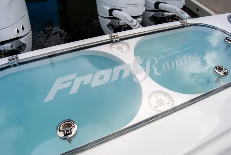 Slide: The Image of 2025 Front Runner 43 Catamaran with sleek design and powerful engines. - 18