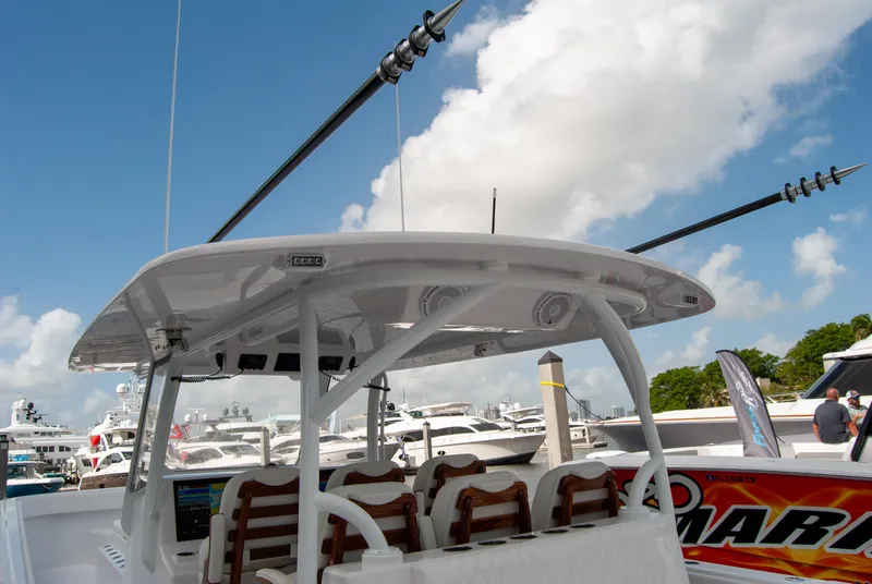 Slide: The Image of 2025 Front Runner 43 Catamaran at marina, showcasing sleek design and modern features. - 26