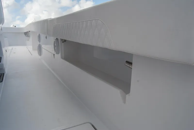 Slide: The Image of 2025 Front Runner 43 Catamaran deck with sleek, modern design and storage compartments. - 30