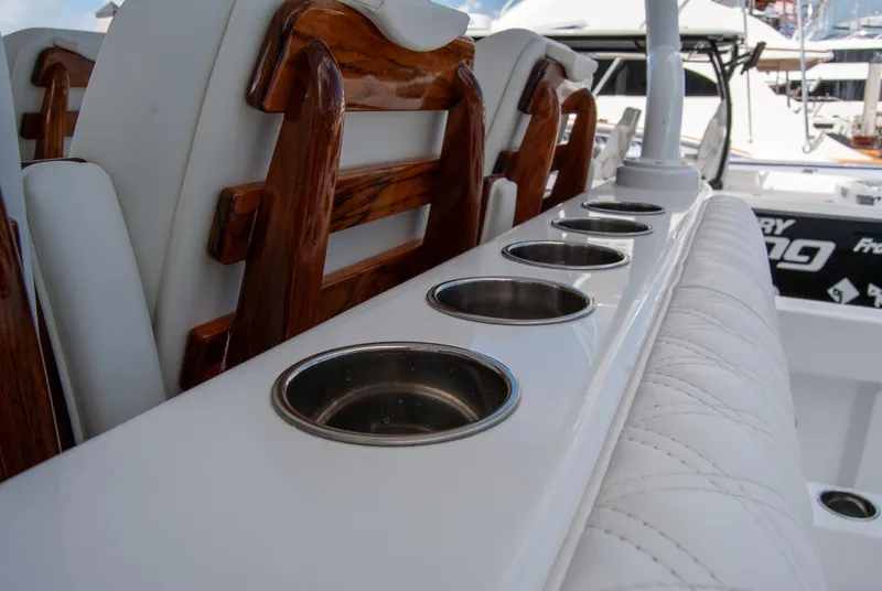 Slide: The Image of Luxury seating and cup holders on 2025 Front Runner 43 Catamaran. - 37