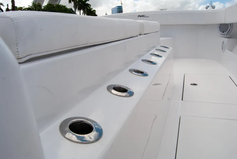 Slide: The Image of 2025 Front Runner 43 Catamaran deck with rod holders and seating. - 42