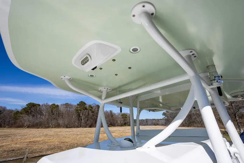 Slide: The Image of 2005 French Yachts 34 Center Console, showcasing sturdy canopy structure and sleek design. - 22