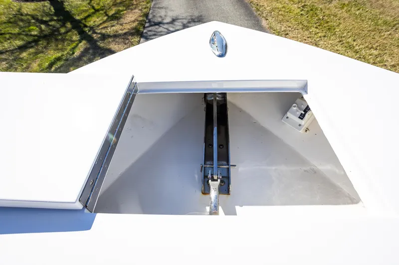 Slide: The Image of Open anchor compartment on 2005 French Yachts 34 Center Console boat. - 23