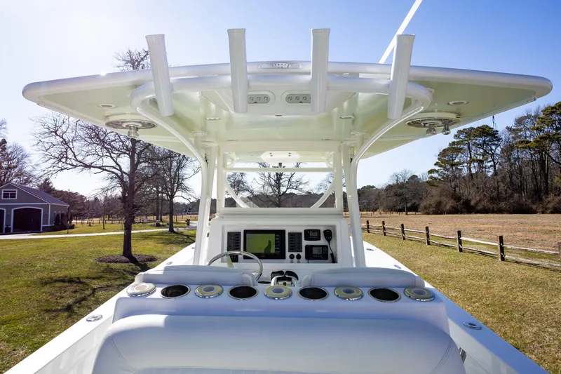 Slide: The Image of 2005 French Yachts 34 Center Console, helm view, featuring modern controls and spacious design. - 40