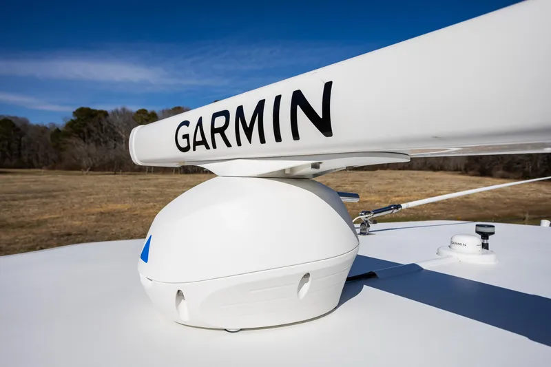 Slide: The Image of Garmin radar on 2005 French Yachts 34 Center Console, clear sky background. - 48