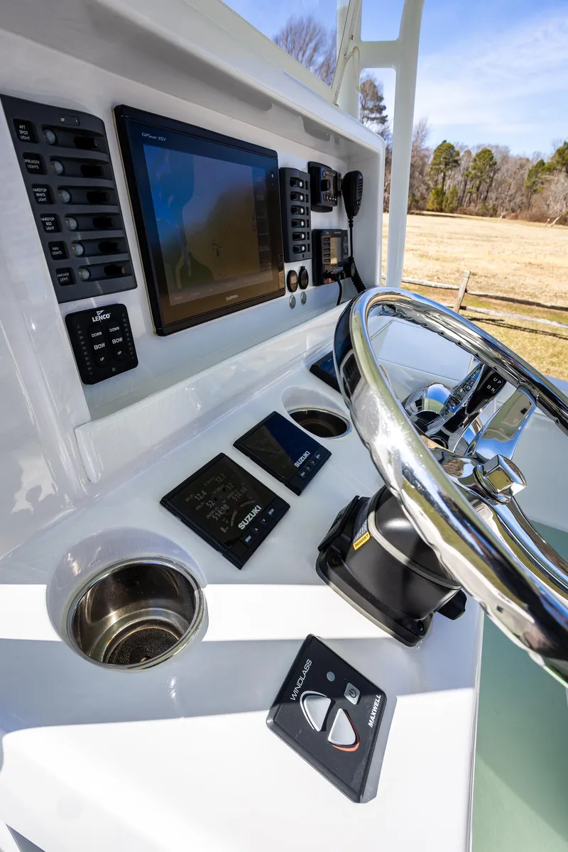 Slide: The Image of Center console of 2005 French Yachts 34, featuring modern navigation and control systems. - 8