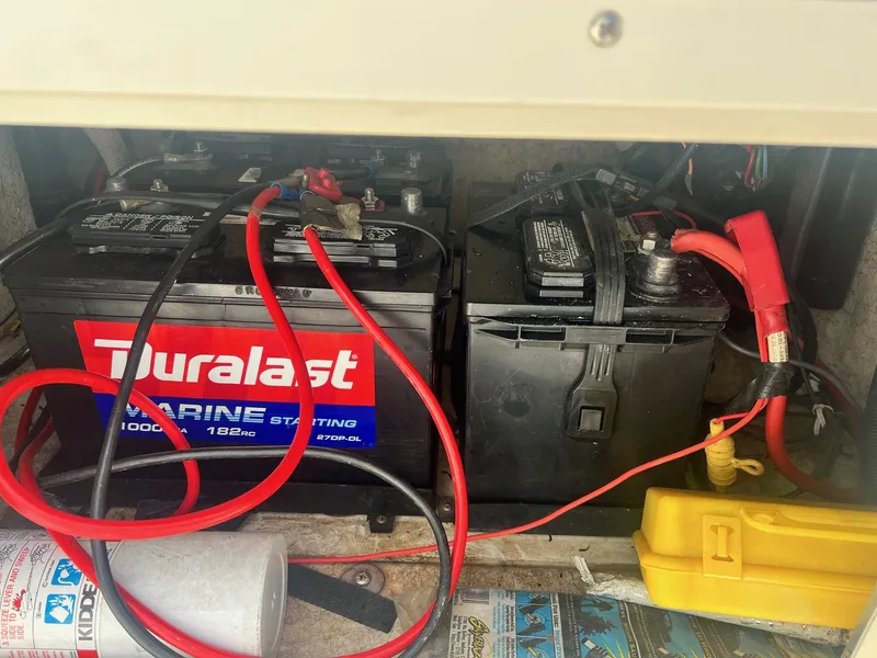 Slide: The Image of Marine batteries in a 2001 Fishmaster 19 CC boat, featuring Duralast brand. - 4