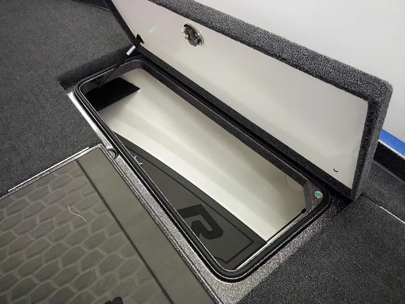 Slide: The Image of 2025 Ranger Z521R Garmin Ranger Cup Equipped storage compartment detail. - 15