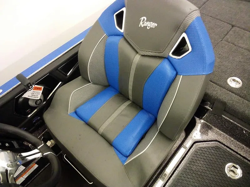 Slide: The Image of 2025 Ranger Z521R Garmin Ranger Cup boat seat, blue and gray design. - 26