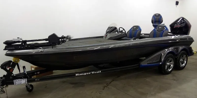 Slide: The Image of 2025 Ranger Z521R Garmin Ranger Cup Equipped boat on trailer in garage. - 38