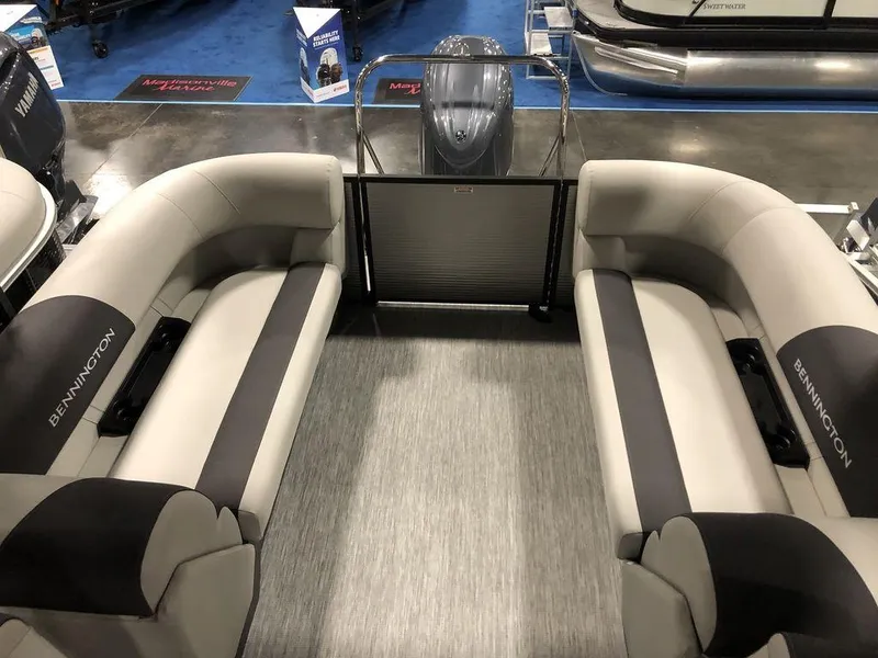 Slide: The Image of 2025 Bennington S Quad Bench 22 SSR interior with dual seating and modern design. - 6