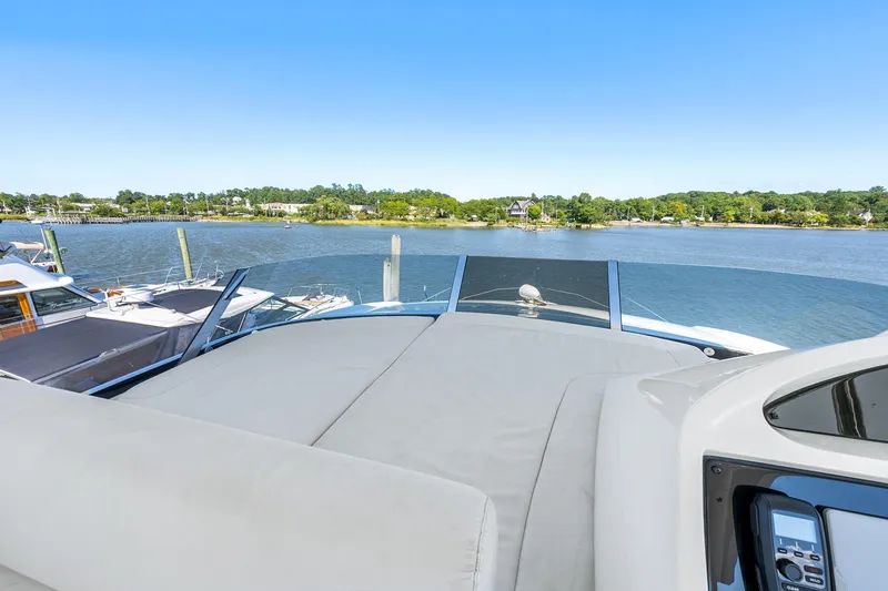 Slide: The Image of Sunseeker Manhattan 65 yacht deck with scenic waterfront view, 2016 model. - 39
