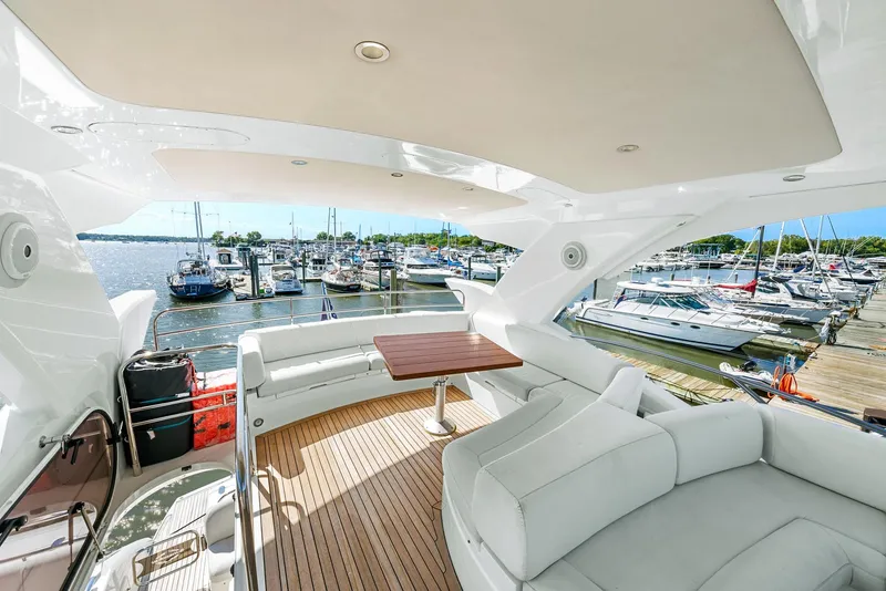 Slide: The Image of Luxurious 2016 Sunseeker Manhattan 65 yacht interior with marina view. - 41