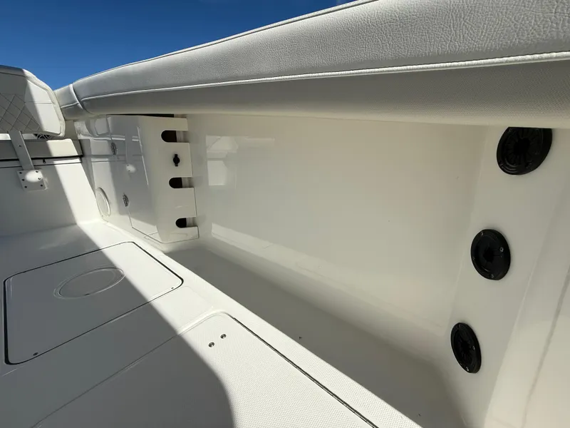 Slide: The Image of 2025 World Cat 325 CC interior, featuring sleek white design and modern fittings. - 9