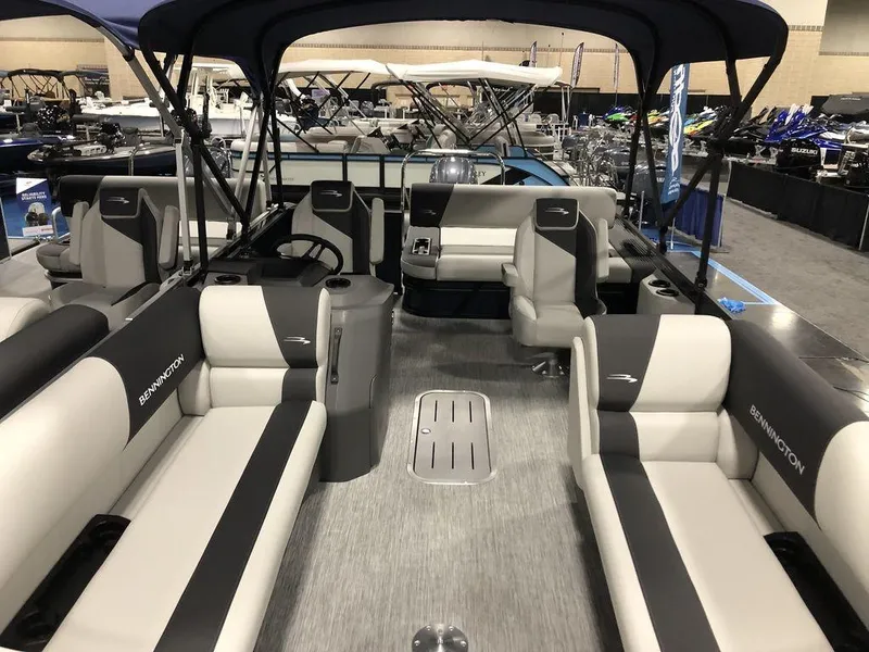 Slide: The Image of 2025 Bennington S Swingback 22 SSB pontoon boat interior with luxurious seating and modern design. - 3