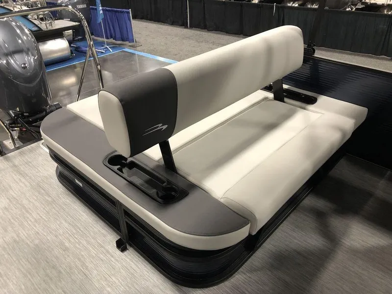 Slide: The Image of 2025 Bennington S Swingback 22 SSB boat seat, gray and white upholstery, indoor display. - 6