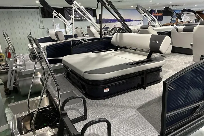 Slide: The Image of 2026 Bennington S Swingback 22 SSB SPS pontoon boat in showroom display. - 9