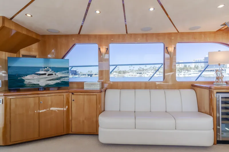 Slide: The Image of Luxurious interior of 2008 Ocean Alexander Pilothouse yacht with white sofa and large windows. - 20