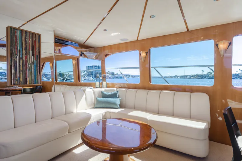 Slide: The Image of Luxurious interior of 2008 Ocean Alexander Pilothouse yacht with plush seating and scenic windows. - 21
