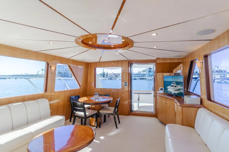 Slide: The Image of Luxurious interior of 2008 Ocean Alexander Pilothouse yacht with elegant seating and dining area. - 22