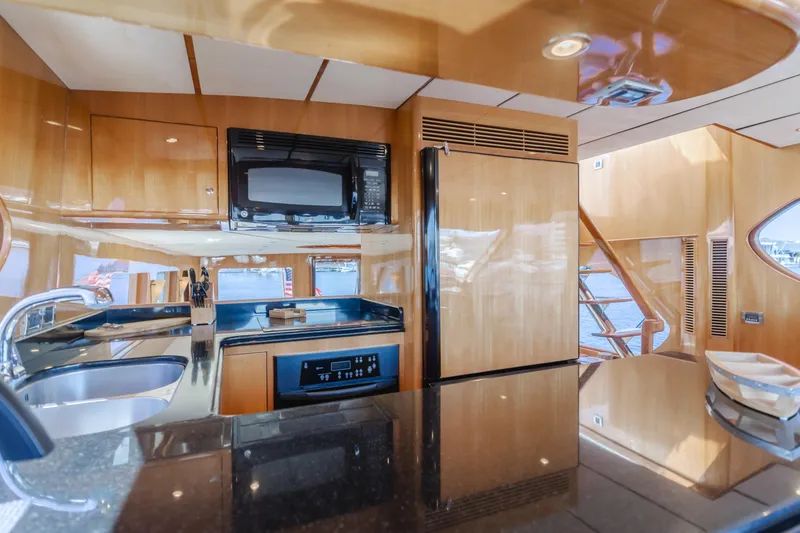 Slide: The Image of Luxurious kitchen interior of 2008 Ocean Alexander Pilothouse yacht with modern appliances. - 27