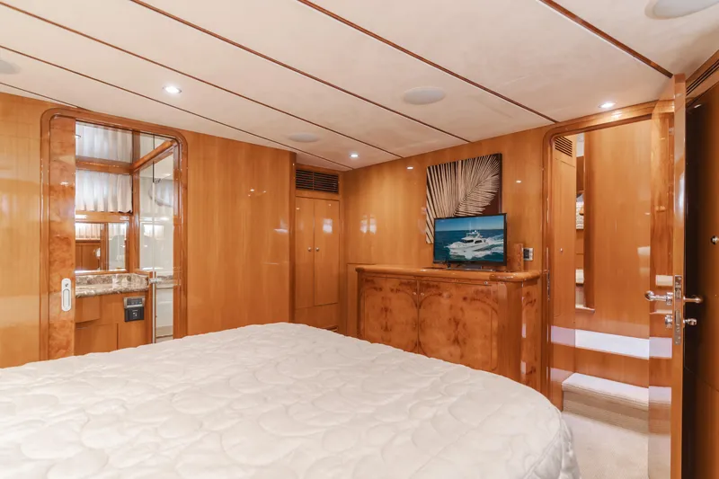 Slide: The Image of Luxurious cabin interior of 2008 Ocean Alexander Pilothouse yacht with wood paneling. - 31