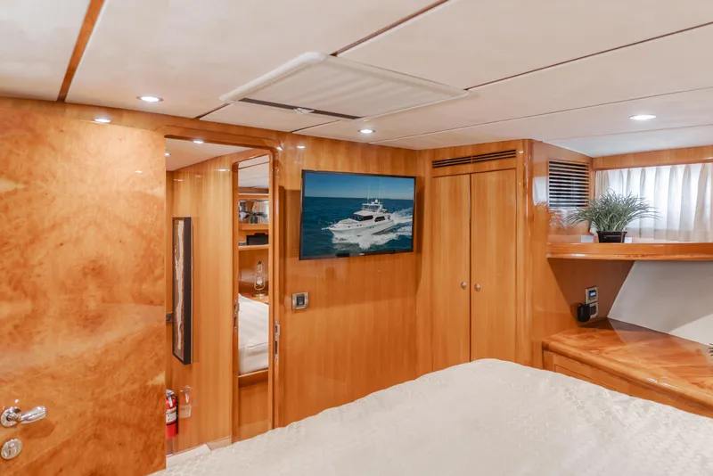 Slide: The Image of Luxurious 2008 Ocean Alexander Pilothouse yacht interior with wood paneling and modern decor. - 34